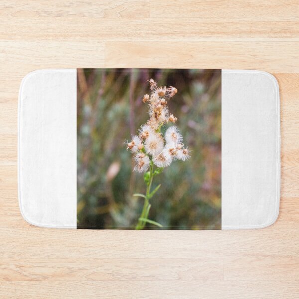 Item preview, Close-Up of White Fluffy Flower Against Blurry Green Background designed and sold by Nmallia.