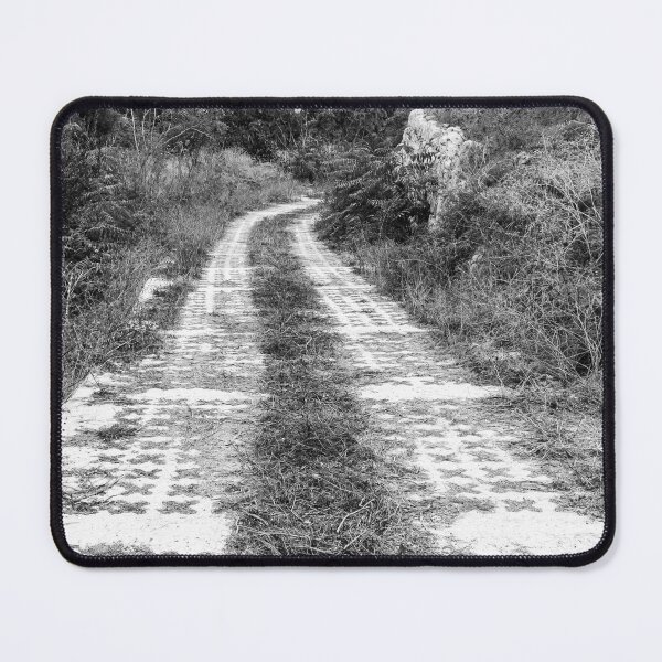 Item preview, Winding Pathway Amid Overgrown Vegetation in Black and White designed and sold by Nmallia.