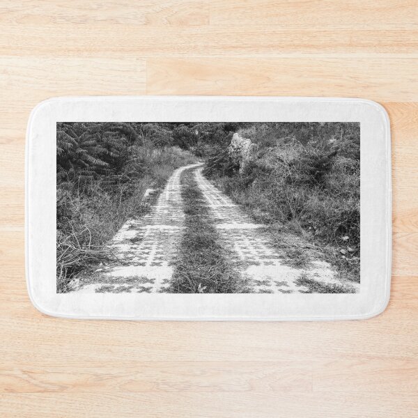 Item preview, Winding Pathway Amid Overgrown Vegetation in Black and White designed and sold by Nmallia.
