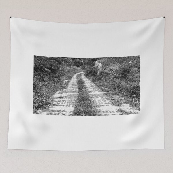 Item preview, Winding Pathway Amid Overgrown Vegetation in Black and White designed and sold by Nmallia.