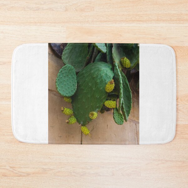 Item preview, Close-Up of Green Prickly Pear Cactus with Yellow Fruits on a Wall designed and sold by Nmallia.