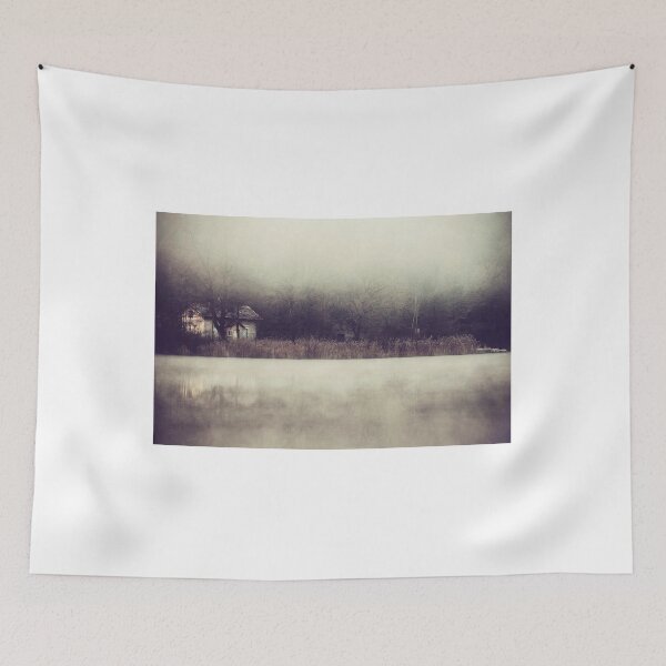 Item preview, Cabaña abandonada y envuelta en niebla a orillas del río, en un bosque brumoso. designed and sold by BarbeeOneida.