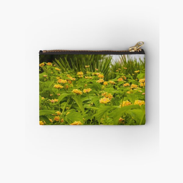 Item preview, Beautiful Yellow Flower Blossoms in a Vibrant Green Garden Landscape designed and sold by Nmallia.