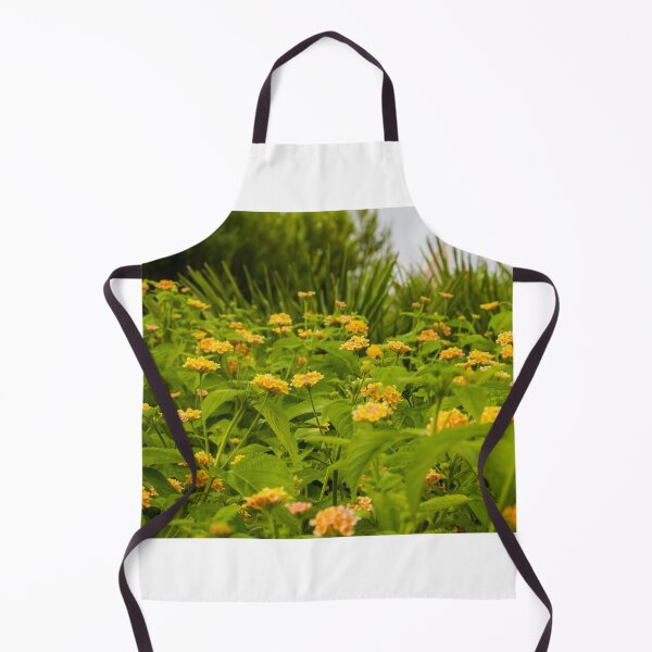 Item preview, Beautiful Yellow Flower Blossoms in a Vibrant Green Garden Landscape designed and sold by Nmallia.