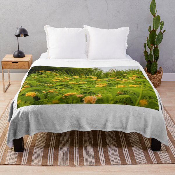 Item preview, Beautiful Yellow Flower Blossoms in a Vibrant Green Garden Landscape designed and sold by Nmallia.