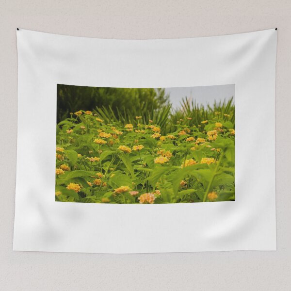 Item preview, Beautiful Yellow Flower Blossoms in a Vibrant Green Garden Landscape designed and sold by Nmallia.