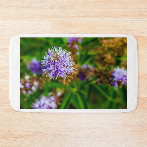 Item preview, Vibrant Purple Flower with Green Foliage in Natural Outdoor Setting designed and sold by Nmallia.