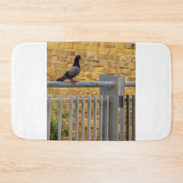 Item preview, Pigeon Perched on Metal Fence with Brick Wall Background designed and sold by Nmallia.