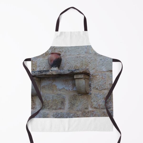 Item preview, Earthenware Jug On Stone Shelf Against Weathered Sandstone Wall In Mediterranean Village designed and sold by Nmallia.
