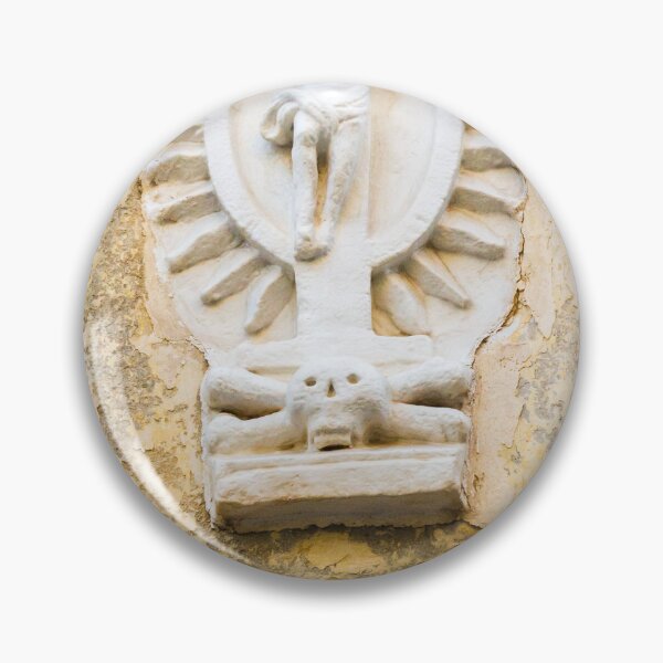 Item preview, White Crucifix Relief With Skull Sculpture On Weathered Yellow Wall Symbolizing Faith And Mortality designed and sold by Nmallia.