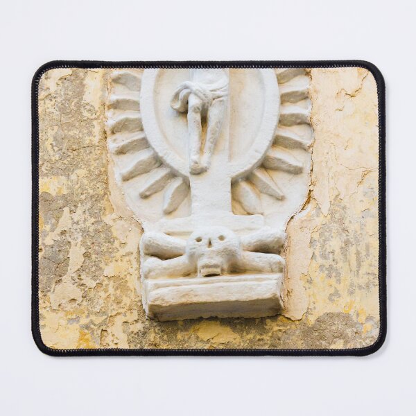 Item preview, White Crucifix Relief With Skull Sculpture On Weathered Yellow Wall Symbolizing Faith And Mortality designed and sold by Nmallia.