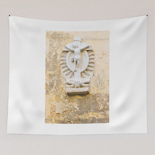 Item preview, White Crucifix Relief With Skull Sculpture On Weathered Yellow Wall Symbolizing Faith And Mortality designed and sold by Nmallia.