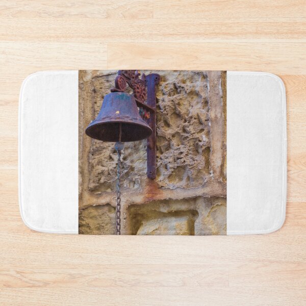 Item preview, Rusty Metal Bell Mounted On Weathered Stone Wall With Chain And Vintage Charm designed and sold by Nmallia.