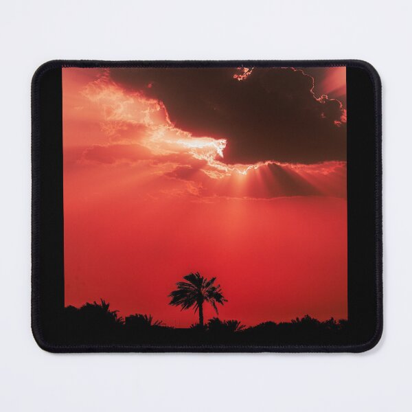 Item preview, Fiery Sunset Sky with Sun Rays Behind Dark Clouds Silhouette designed and sold by AbulailArt.