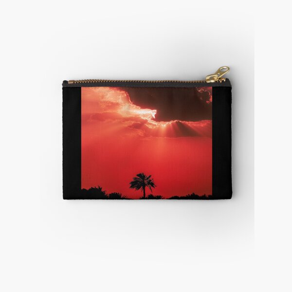 Item preview, Fiery Sunset Sky with Sun Rays Behind Dark Clouds Silhouette designed and sold by AbulailArt.