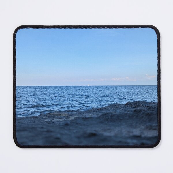 Item preview, Distant Lighthouse Over Rocky Lake Shoreline designed and sold by Adventure Ambience Studio.