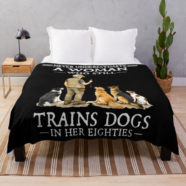 Item preview, Never Underestimate A Woman Who Still Trains Dogs In Her designed and sold by Trippy-Toad.