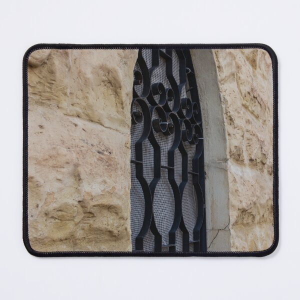 Item preview, Rustic Stone Wall With Arched Window And Decorative Iron Bars On Exterior Building designed and sold by Nmallia.