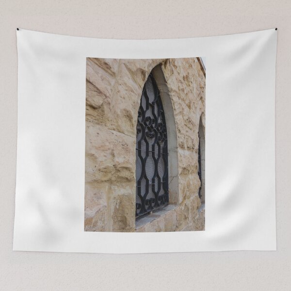 Item preview, Rustic Stone Wall With Arched Window And Decorative Iron Bars On Exterior Building designed and sold by Nmallia.
