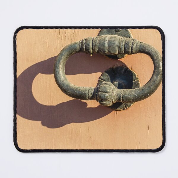 Item preview, Antique Iron Door Knocker On Peach Wooden Door With Shadow In Bright Sunlight Texture designed and sold by Nmallia.