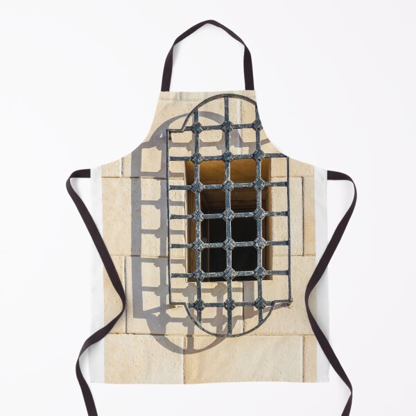 Item preview, Intricate Iron Window Grille Over Beige Stone Wall Casting Long Shadow in Warm Sunlight designed and sold by Nmallia.