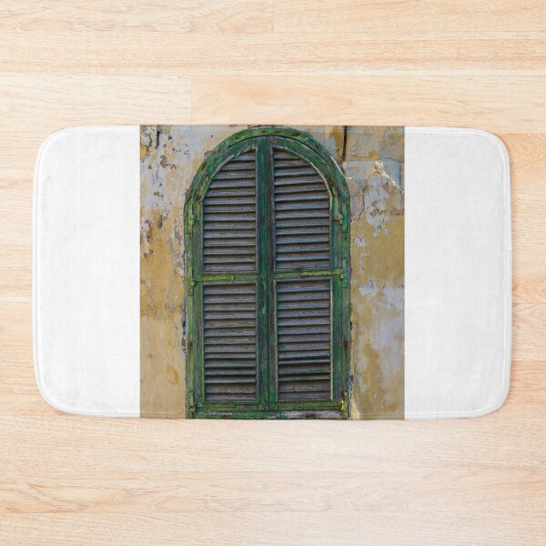 Item preview, Weathered Green Arch Window Shutter On Crumbling Yellow Wall Exuding Rustic Mediterranean Charm designed and sold by Nmallia.