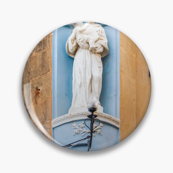 Item preview, White Saint Statue Holding Child in Blue Niche on Weathered Church Facade, Religious Architectural Detail designed and sold by Nmallia.