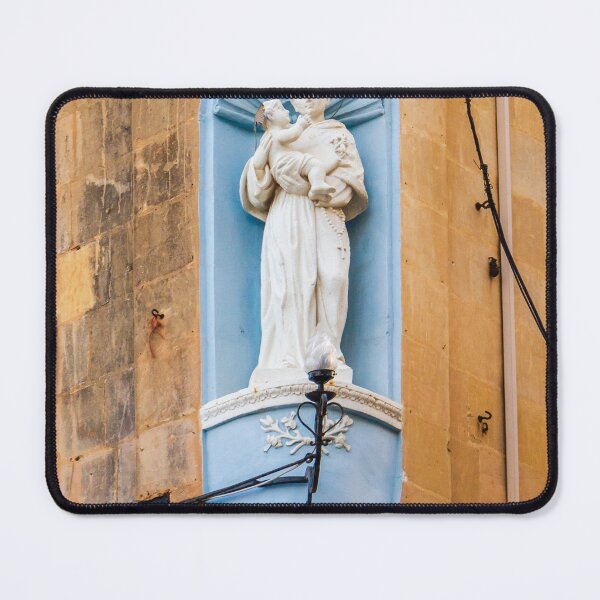Item preview, White Saint Statue Holding Child in Blue Niche on Weathered Church Facade, Religious Architectural Detail designed and sold by Nmallia.