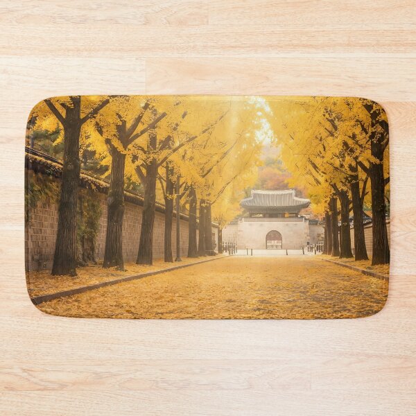 Item preview, Golden Autumn Ginkgo Tree Tunnel at Deoksugung Stone Wall Road, Seoul: Vibrant Fall Foliage & Yellow Carpet Art Print, Poster & Home Decor designed and sold by SOOstudio73.