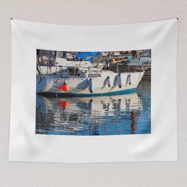 Item preview, Small Sailboat with Colourful Reflections Anchored in Calm Harbour Waters designed and sold by Dorset Girl.