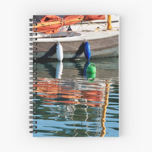 Item preview, Small Sailboat with Colourful Reflections Anchored in Calm Harbour Waters designed and sold by Dorset Girl.