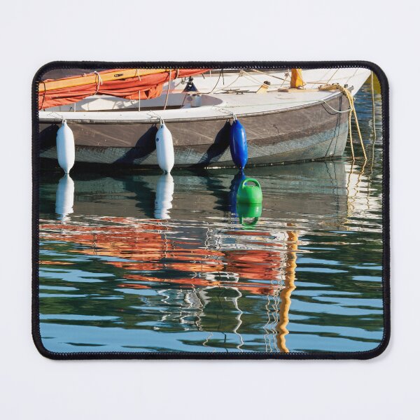Item preview, Small Sailboat with Colourful Reflections Anchored in Calm Harbour Waters designed and sold by Dorset Girl.