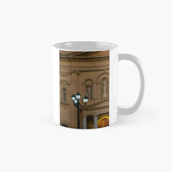 Item preview, Glowing Street Lamp in Front of Historic Classical Building With Statue and Columns at Night designed and sold by Nmallia.