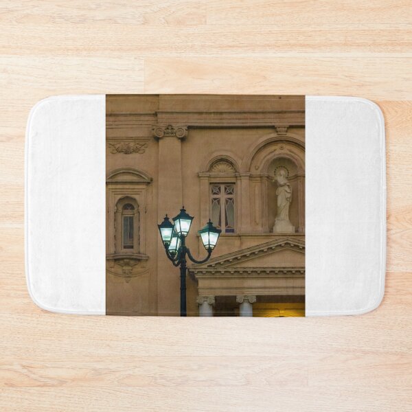 Item preview, Glowing Street Lamp in Front of Historic Classical Building With Statue and Columns at Night designed and sold by Nmallia.