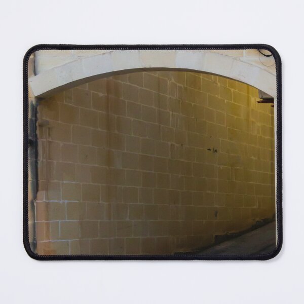Item preview, Stone Archway Over Narrow Alleyway Leading to Shaded Urban Passage With Textured Limestone Walls designed and sold by Nmallia.