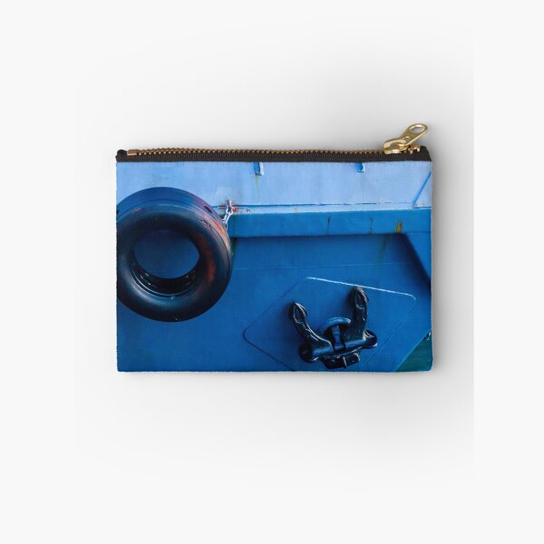 Item preview, Blue Boat Hull With Black Tire Fender And Anchor Close-Up At Harbor Dock designed and sold by Nmallia.