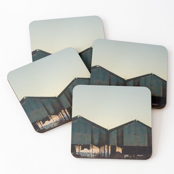 Item preview, Silhouetted Rusted Warehouse Sheds Along Waterfront At Sunset With Dusk Sky and Pier Structures designed and sold by Nmallia.