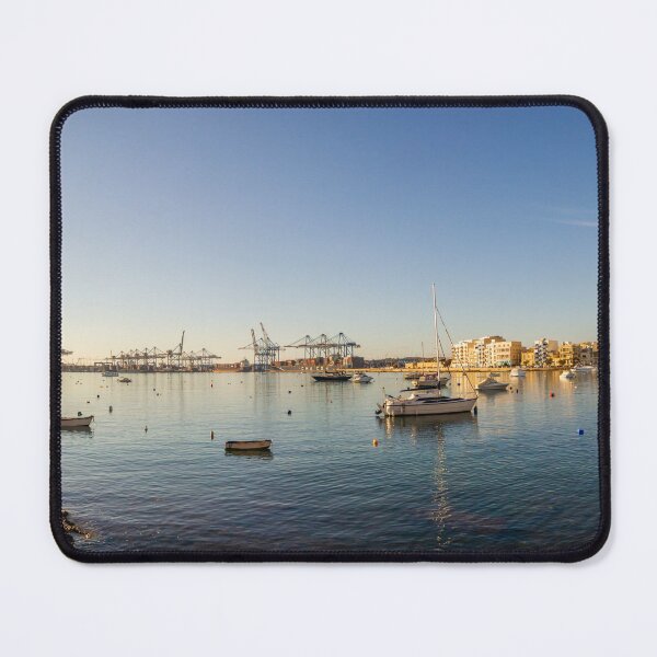 Item preview, Scenic Harbor With Boats and Calm Sea at Sunset Over Coastal Town Waterfront designed and sold by Nmallia.
