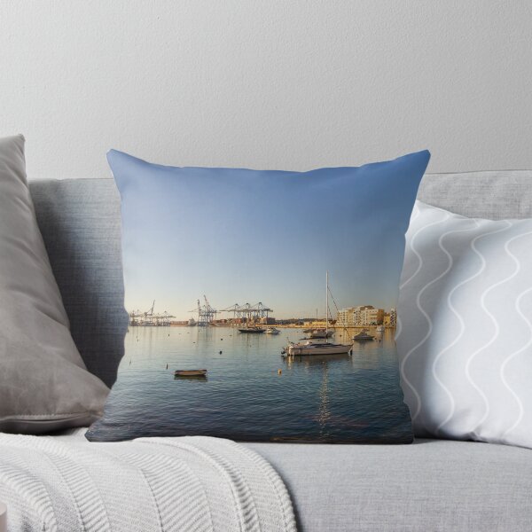 Item preview, Scenic Harbor With Boats and Calm Sea at Sunset Over Coastal Town Waterfront designed and sold by Nmallia.