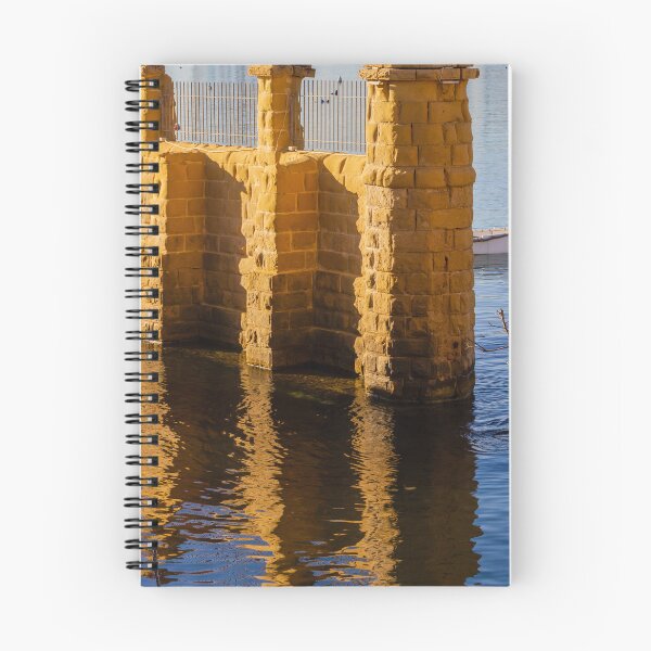 Item preview, Golden Stone Pillars by Calm Harbor Water with Reflective Surface and Sunlit Brick Wall designed and sold by Nmallia.