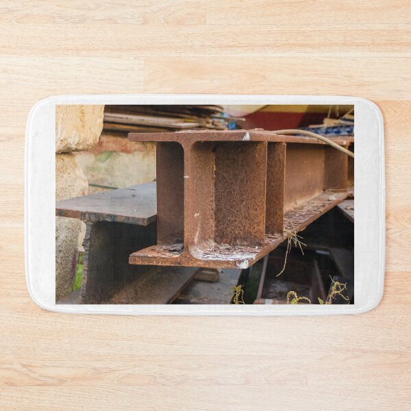 Item preview, Rusty Steel I-Beams Stacked in Industrial Scrap Yard Showing Corrosion, Texture and Decay designed and sold by Nmallia.
