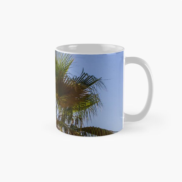 Item preview, Palm Tree Under Clear Blue Sky With Bright Green Fronds and Sunny Light designed and sold by Nmallia.