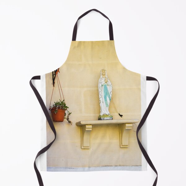 Item preview, Statue Of Virgin Mary On Shelf Beside Hanging Plant Against Light Beige Wall designed and sold by Nmallia.