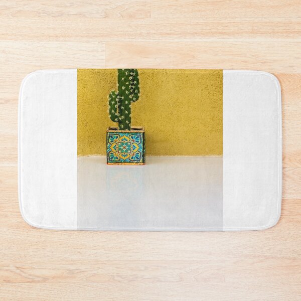 Item preview, Cactus in Colorful Decorative Pot Against Bright Yellow Wall for Vibrant Home Decor designed and sold by Nmallia.