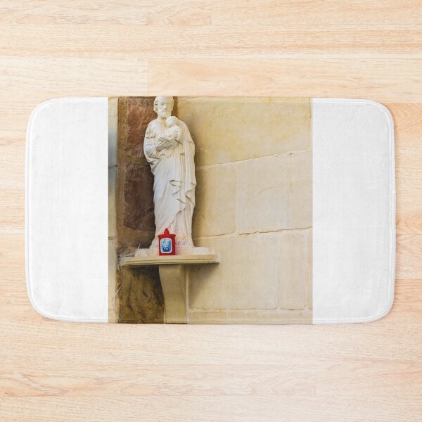 Item preview, Saint Statue Holding Baby Jesus On Outdoor Wall Niche With Red Candle designed and sold by Nmallia.