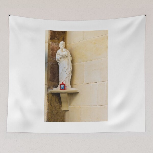 Item preview, Saint Statue Holding Baby Jesus On Outdoor Wall Niche With Red Candle designed and sold by Nmallia.