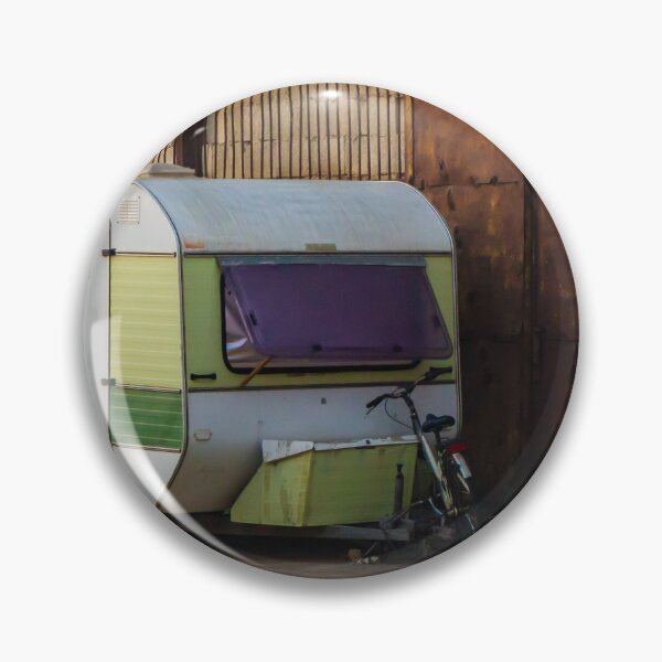 Item preview, Vintage Green Caravan Parked Beside Rusty Industrial Warehouse With Bicycle and Fishing Gear designed and sold by Nmallia.