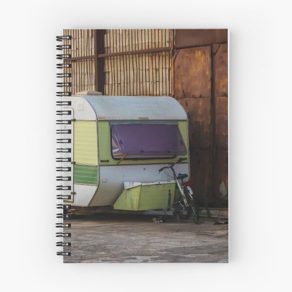 Item preview, Vintage Green Caravan Parked Beside Rusty Industrial Warehouse With Bicycle and Fishing Gear designed and sold by Nmallia.