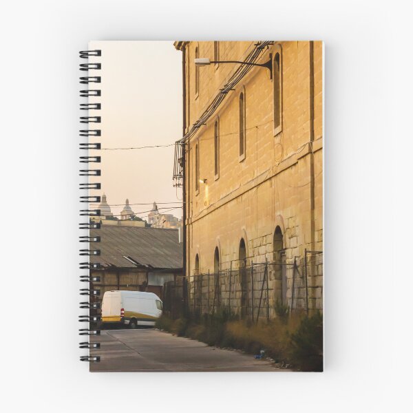 Item preview, Golden Light on Historic Stone Warehouse Alley With Parked Delivery Van at Dusk designed and sold by Nmallia.
