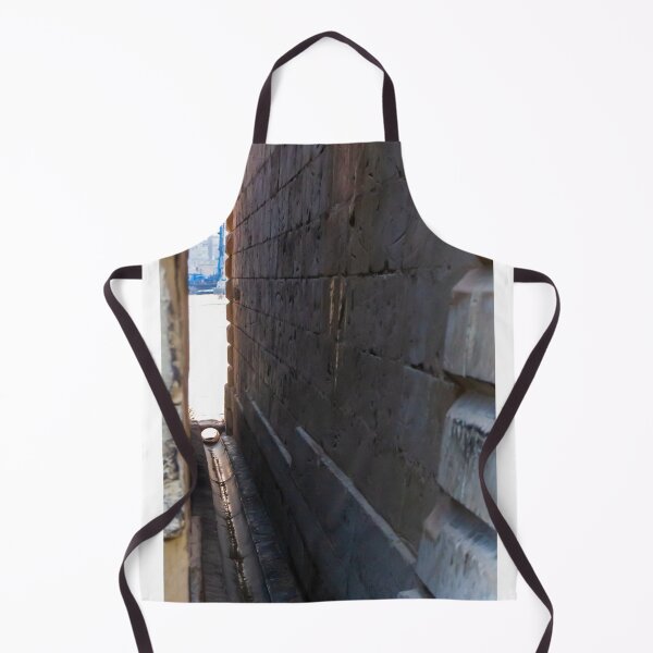 Item preview, Narrow Stone Dockside Gap With Water Channel and Industrial Harbor Visible in Background designed and sold by Nmallia.